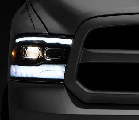 AlphaRex 09-18 Dodge Ram 1500HD PRO-Series Projector Headlights Plank Style Black w/Seq Signal/DRL 880597