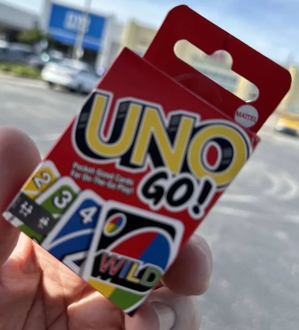 UNO GO! Pocket-Sized Cards for On The Go Play Mini Sized Playing Cards for Travel Stocking Stuffer Birthday Party Kids, Adults Family Game Night Color Matching Fun