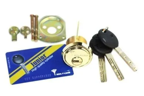 Mul-T-Lock Junior Polished Brass Rim/Mortise Cylinder With 2 Keys and Card